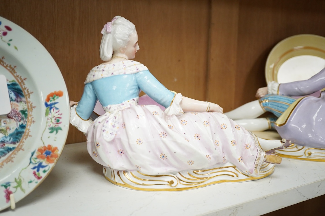 A pair of French porcelain figural sweet meat dishes, late 19th century, 34.5cm